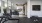 State-of-the-art fitness center with cardio machines, weights, and city views at 2811 Maple