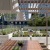 Lush garden courtyard featuring a wooden pergola, dining area, and greenery at 2811 Maple