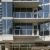 Outdoor resident lounge with fire pit, seating, and grilling area at 2811 Maple