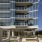 Outdoor resident lounge with fire pit, seating, and grilling area at 2811 Maple
