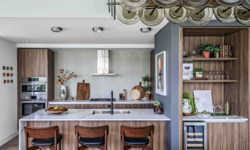 a kitchen with marble counter tops
